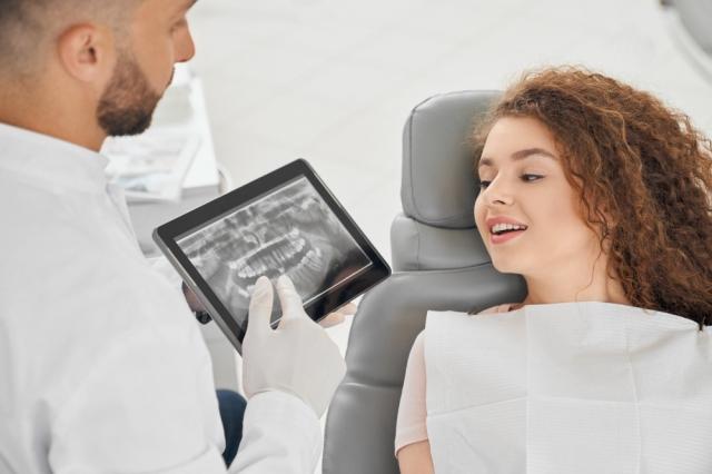 How Dental Implants Can Improve Your Oral Health and Confidence cover picture