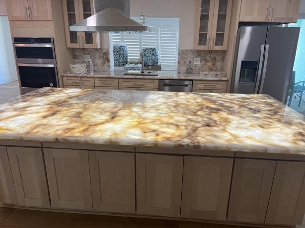 Illuminate Your Home with Stunning Backlit Countertops by Granite and Marble Designs cover picture