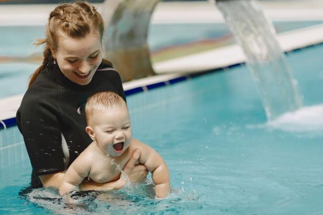 The Developmental Milestones Achieved Through Baby Swimming cover picture