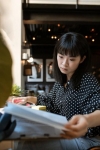 An image of a Dallas woman looking at some papers