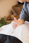 An image of a person during massage therapy 