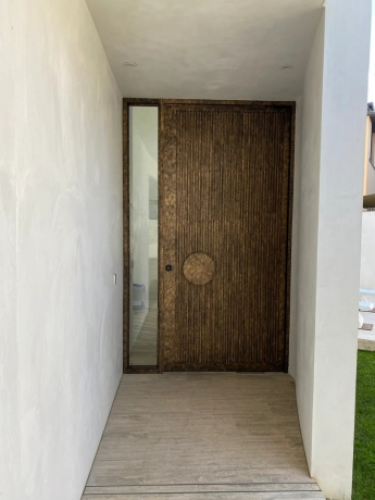 Transform Your Home’s Entrance with Modern Pivot Front Entry Doors