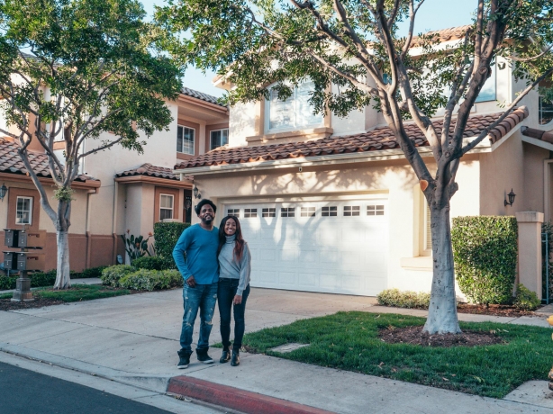 Photo by Kindel Media: https://www.pexels.com/photo/couple-standing-in-front-of-their-house-7579041/