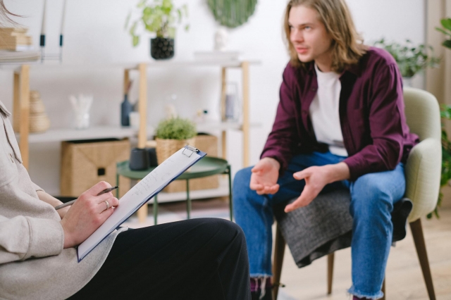 Photo by SHVETS production: https://www.pexels.com/photo/close-up-shot-of-a-person-interviewing-a-man-7176057/