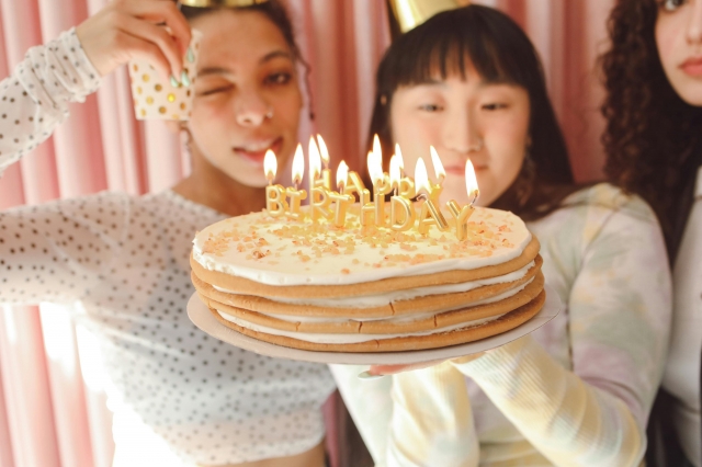 Photo by Polina Tankilevitch: https://www.pexels.com/photo/girls-holding-a-birthday-cake-with-burning-candles-7337020/