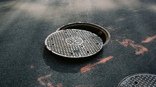 What Does the Sanitation and Conservation of Scuppers and Manhole Manholes Involve