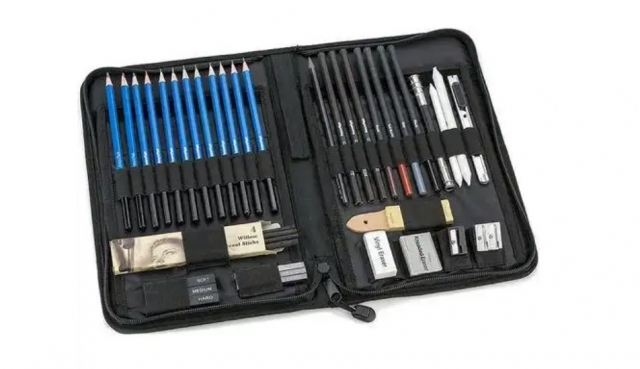 What are the essential drawing tools that every artist should consider for precision and creativity