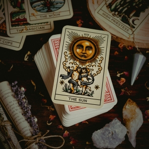 Exploring the Cosmic Connection: How Astrology and Tarot Card Reading Work Together