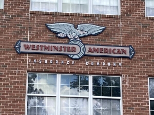 Standing Out from the Crowd: Crafting Unique Outdoor Building Signs for Business Success