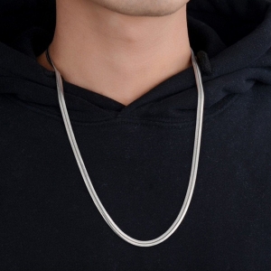 Shirt Unbuttoned, Chain Out: The Perfect Beach-to-Bar Look