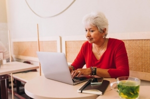 A compassionate case manager discussing care options with an elderly client and their family
