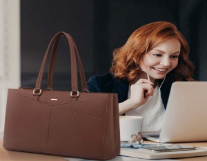 What is the most comfortable way to carry a laptop?