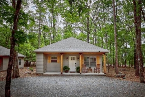 How do cabins offer a cozy escape from busy city life?