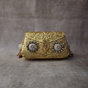 Mini but Mighty: Compact Gold Designer Clutches That Make a Big Statement
