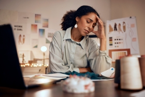 young woman facing financial hardship