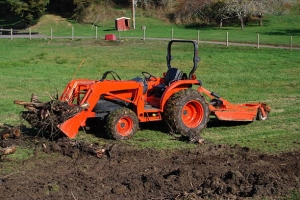 How Used Garden Tractors and Attachments Improve Gardening Efficiency 