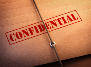 envelope marked CONFIDENTIAL to symbolize confidentiality and privacy