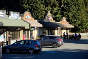 How can you save money when travelling by taxi in smaller towns?