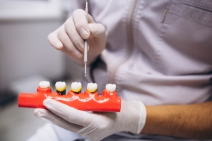 How Dental Implant Supported Dentures Improve Comfort and Confidence