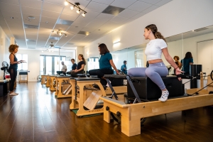 Why Reformer Pilates Classes Could Be the Workout You’ve Been Searching For