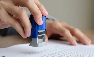 Why Do Businesses Still Lean on Signature Stamps for Checks