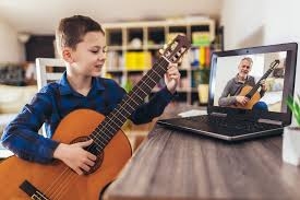 How Can Donating a Guitar Help Support Music Therapy for Grieving Children?