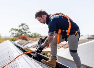 Expert electrician North Adelaide ensuring safe and efficient electrical work on a roof installation.