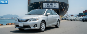 Japanese used car being shipped from Japan to Pakistan at a port.