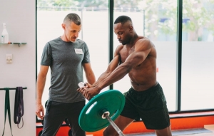 Why Your Workout Buddy Should Be a Pro