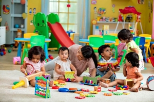 How do preschools foster kids' social skills and cognitive development?