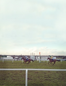 Two jockeys on their horses