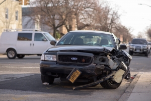 a black car with a damaged front end
