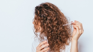 Struggling with frizzy hair? Want to know how to tame it naturally?