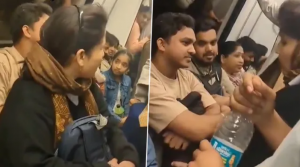 Viral Video of Women seated on a man’s lap Inside Delhi Metro