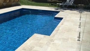 What Makes Natural Stones a Great Choice for Pool Coping Tiles?