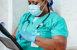 A CRNA wearing a face mask