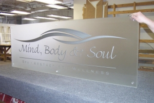 The Process Behind Creating Stunning Etched Glass Signs