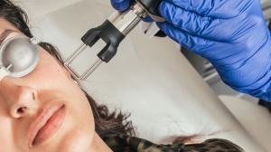 What is the cost range for treating wrinkles around the eyes with Fractional CO2 Laser in Dubai?