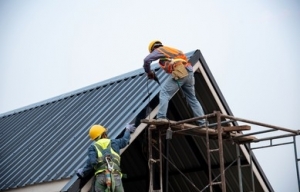 The Vital Role of a Roofer in Building Construction