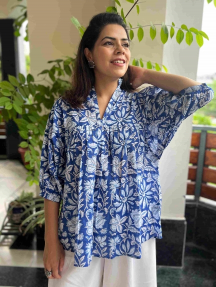 Why Everyone Is Obsessed With Sea Blue Tops