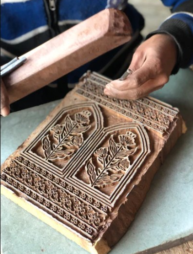 Explore the history of the origin and development of block printing technique
