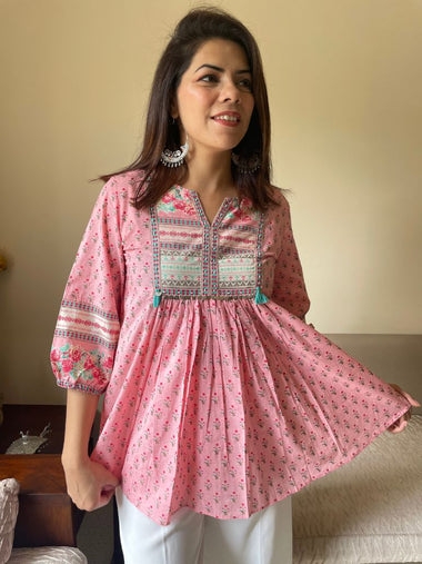 How to Wear a Pink Cotton Top to the Office and Still Look Professional
