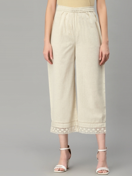 Make a Statement Wearing an Elegant Off White Palazzo Pant This Summer